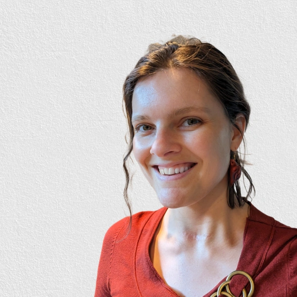 profile photo of a woman smiling radiently